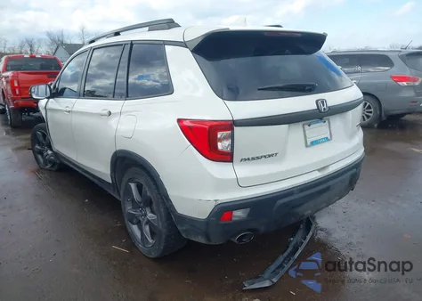2019 Honda Passport Touring z USA, uszkodzony, nr VIN 5FNYF7H98KB001396